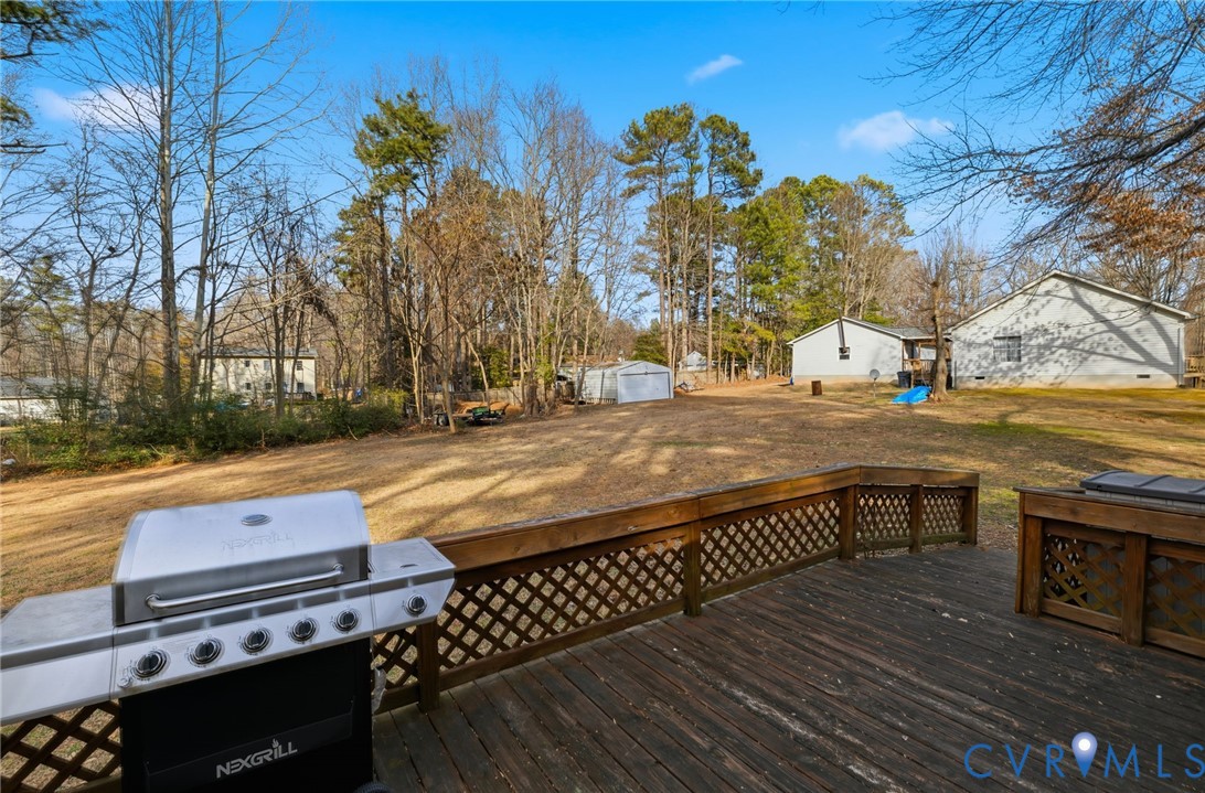 12145 White Bark Road Ruther Glen, VA 22546 - Photo 17 of 23 a view of a backyard with sitting area
