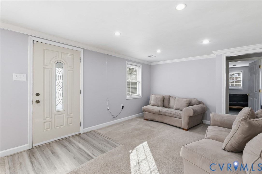 12145 White Bark Road Ruther Glen, VA 22546 - Photo 5 of 23 a living room with furniture and a window