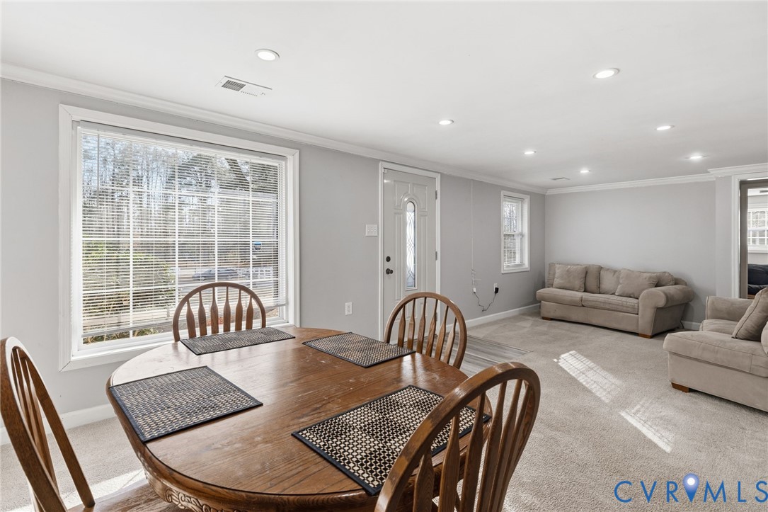 12145 White Bark Road Ruther Glen, VA 22546 - Photo 7 of 23 a living room with furniture and a window