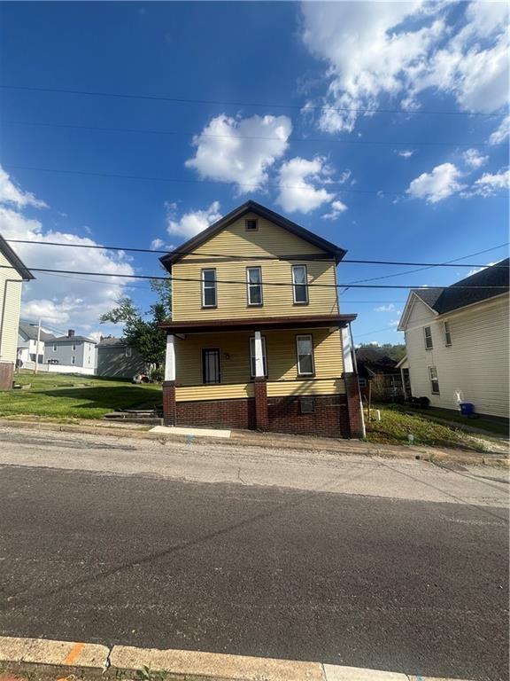 16 Oak Street Manor, PA 15665 - Photo 1 of 18 a view of a house with a street