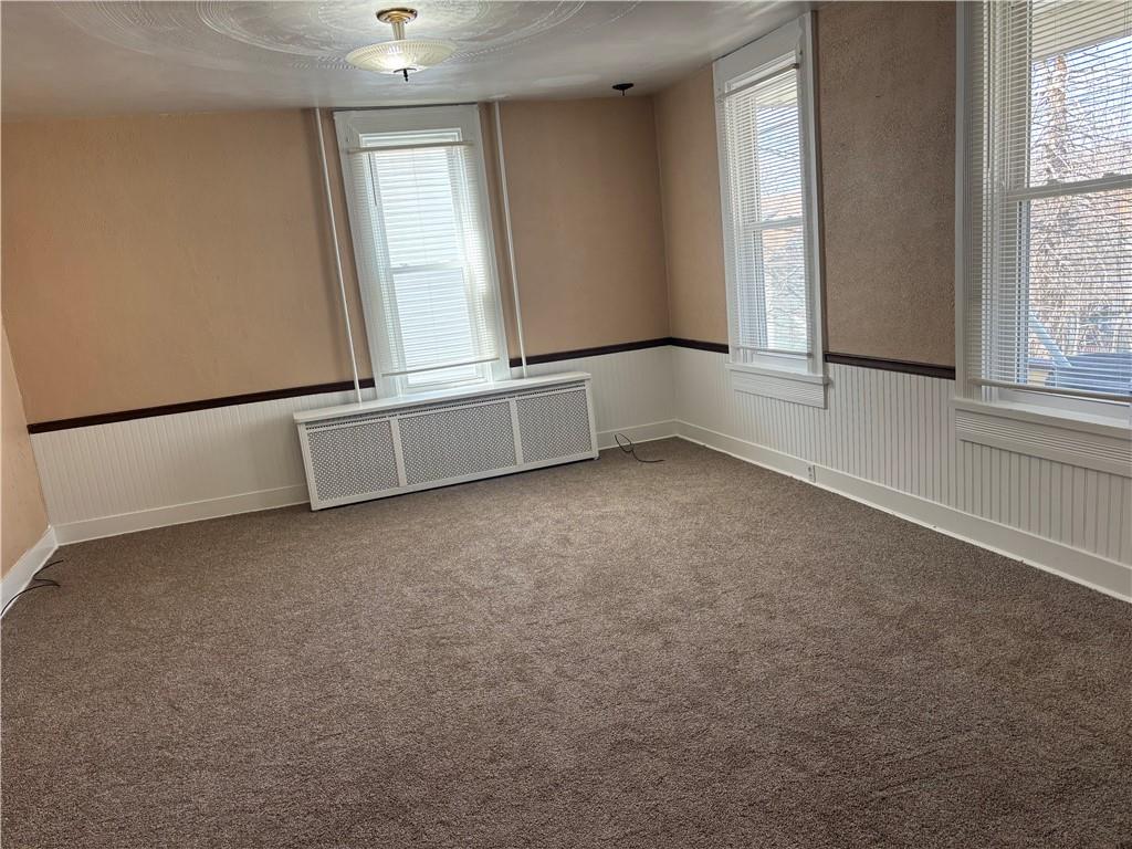 16 Oak Street Manor, PA 15665 - Photo 12 of 18 an empty room with windows
