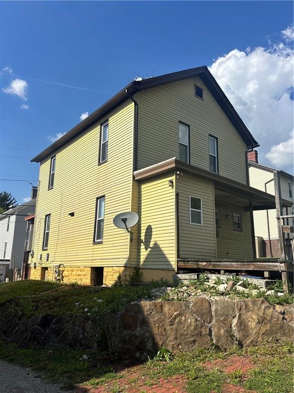 16 Oak Street Manor, PA 15665 - Photo 2 of 18 a front view of a house with garden
