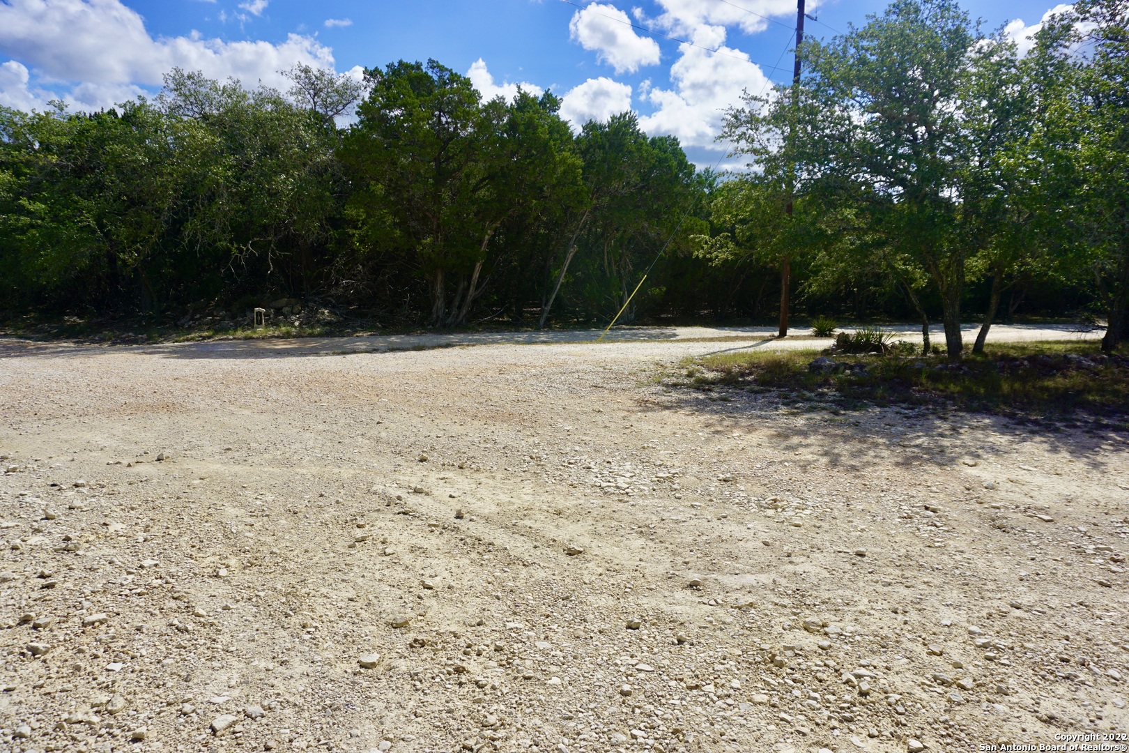 127 Leaders Hill Road Wimberley, TX 78676 - Photo 14 of 43 a view of a yard with a tree
