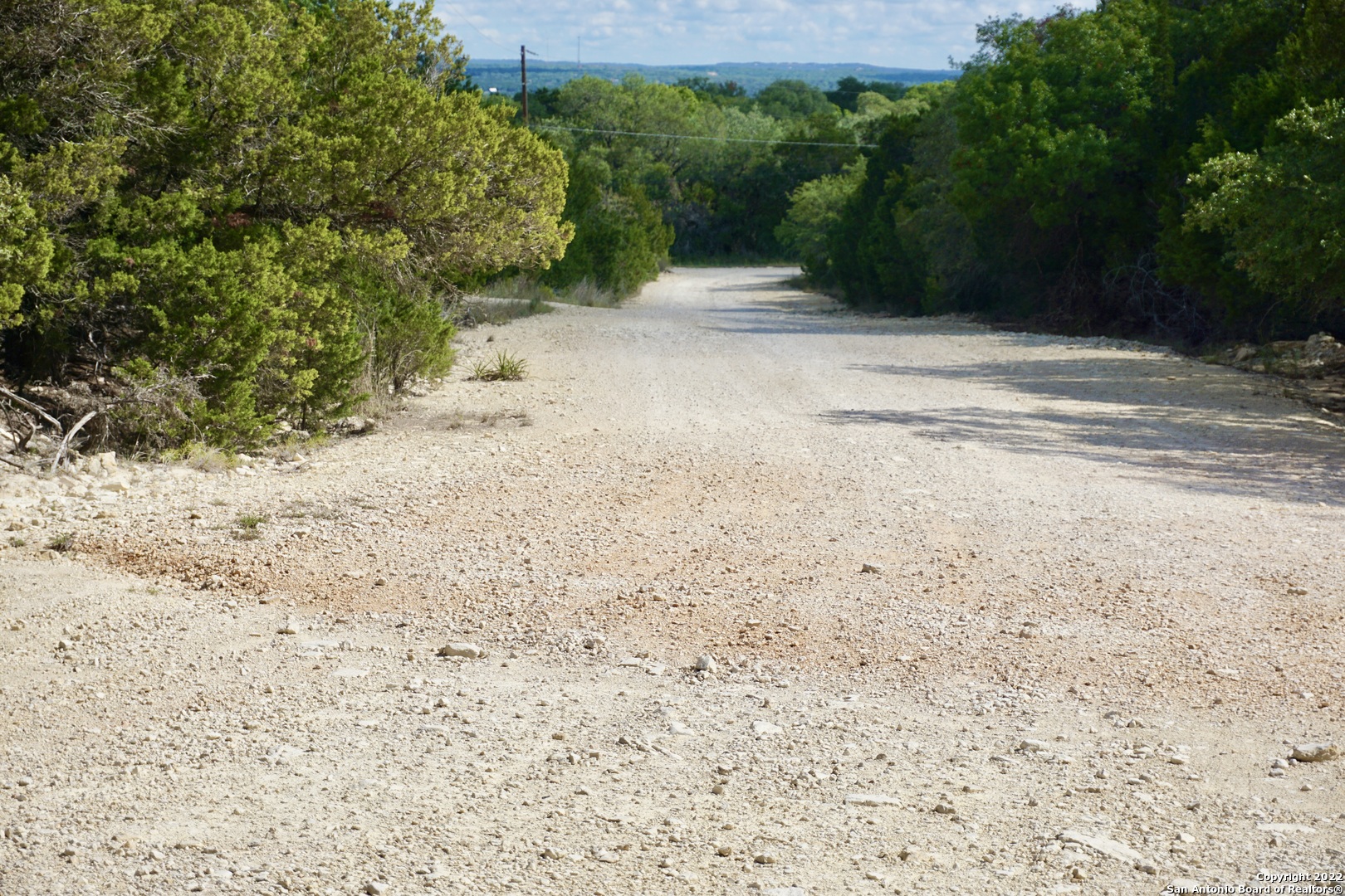 127 Leaders Hill Road Wimberley, TX 78676 - Photo 15 of 43 a view of a yard with a trees