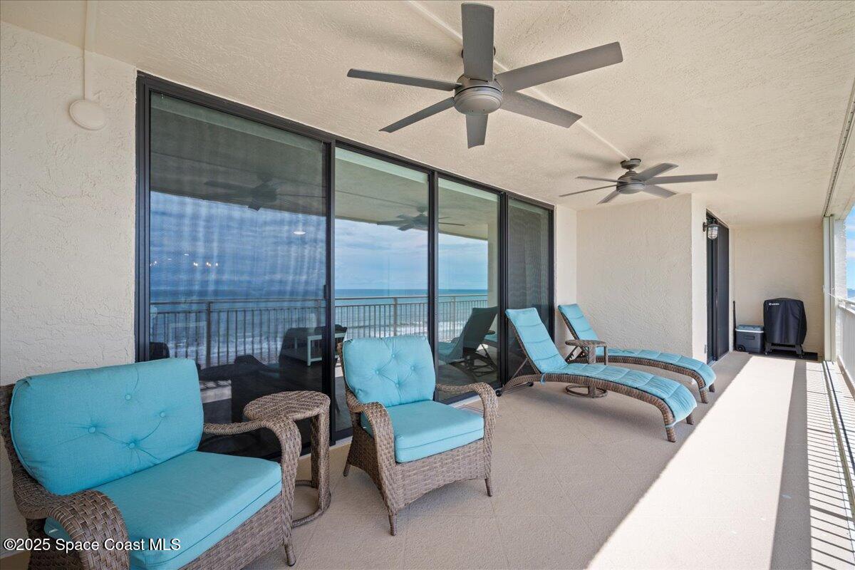 3221 South Atlantic Avenue, Unit 703 Cocoa Beach, FL 32931 - Photo 30 of 77 a living room with furniture