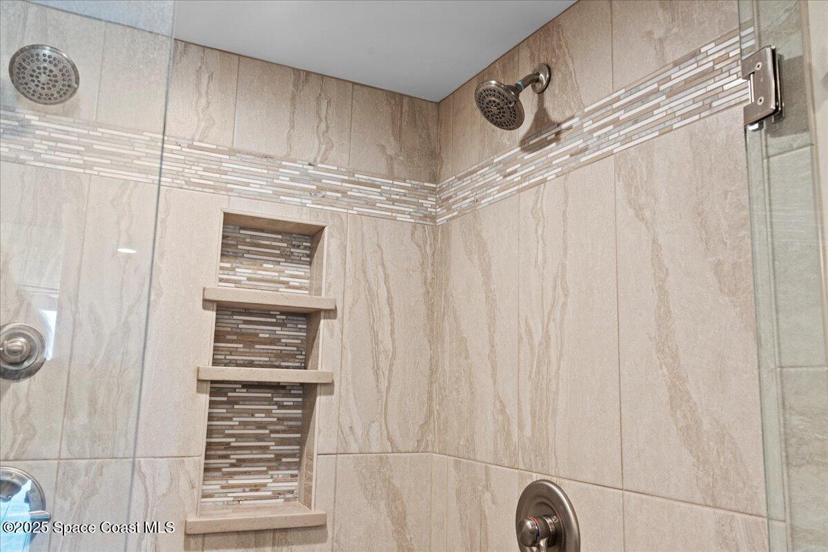 3221 South Atlantic Avenue, Unit 703 Cocoa Beach, FL 32931 - Photo 39 of 77 a close up of a shower curtain