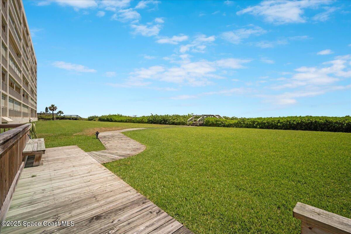 3221 South Atlantic Avenue, Unit 703 Cocoa Beach, FL 32931 - Photo 61 of 77 a view of a lake with a outdoor space
