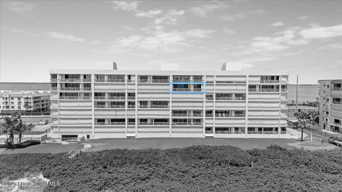 3221 South Atlantic Avenue, Unit 703 Cocoa Beach, FL 32931 - Photo 67 of 77 a view of a large building