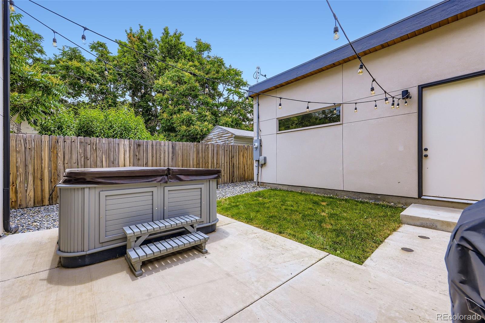 4455 Tejon Street Denver, CO 80211 - Photo 25 of 28 a view of a backyard with sitting area