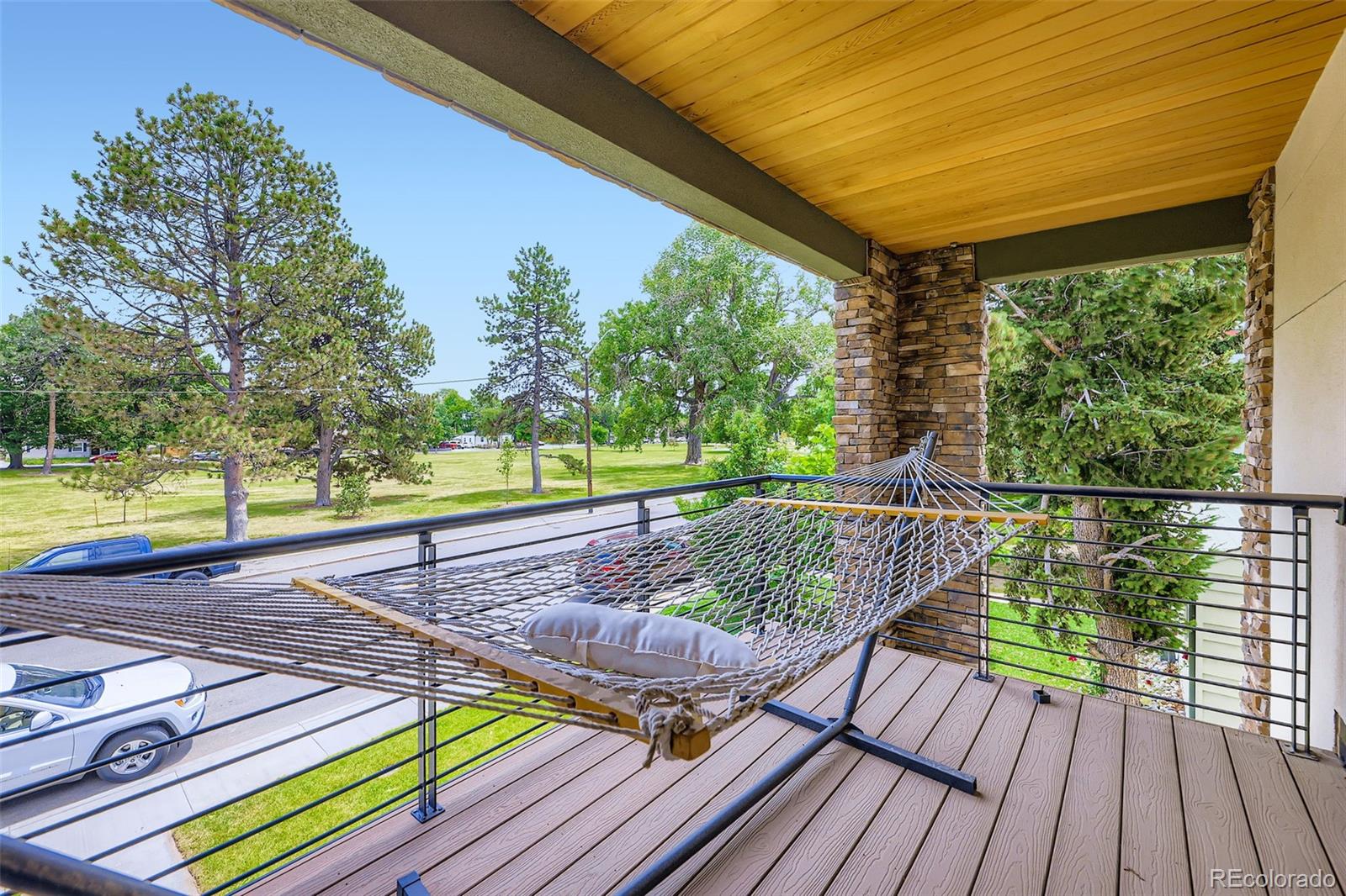 4455 Tejon Street Denver, CO 80211 - Photo 28 of 28 a view of a wooden deck with a yard