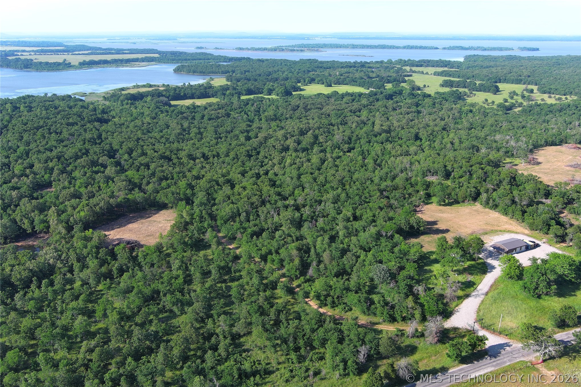 20862 East 1160th Road Keota, OK 74941 - Photo 15 of 47 Expansive acreage featuring dense woodlands and cleared areas