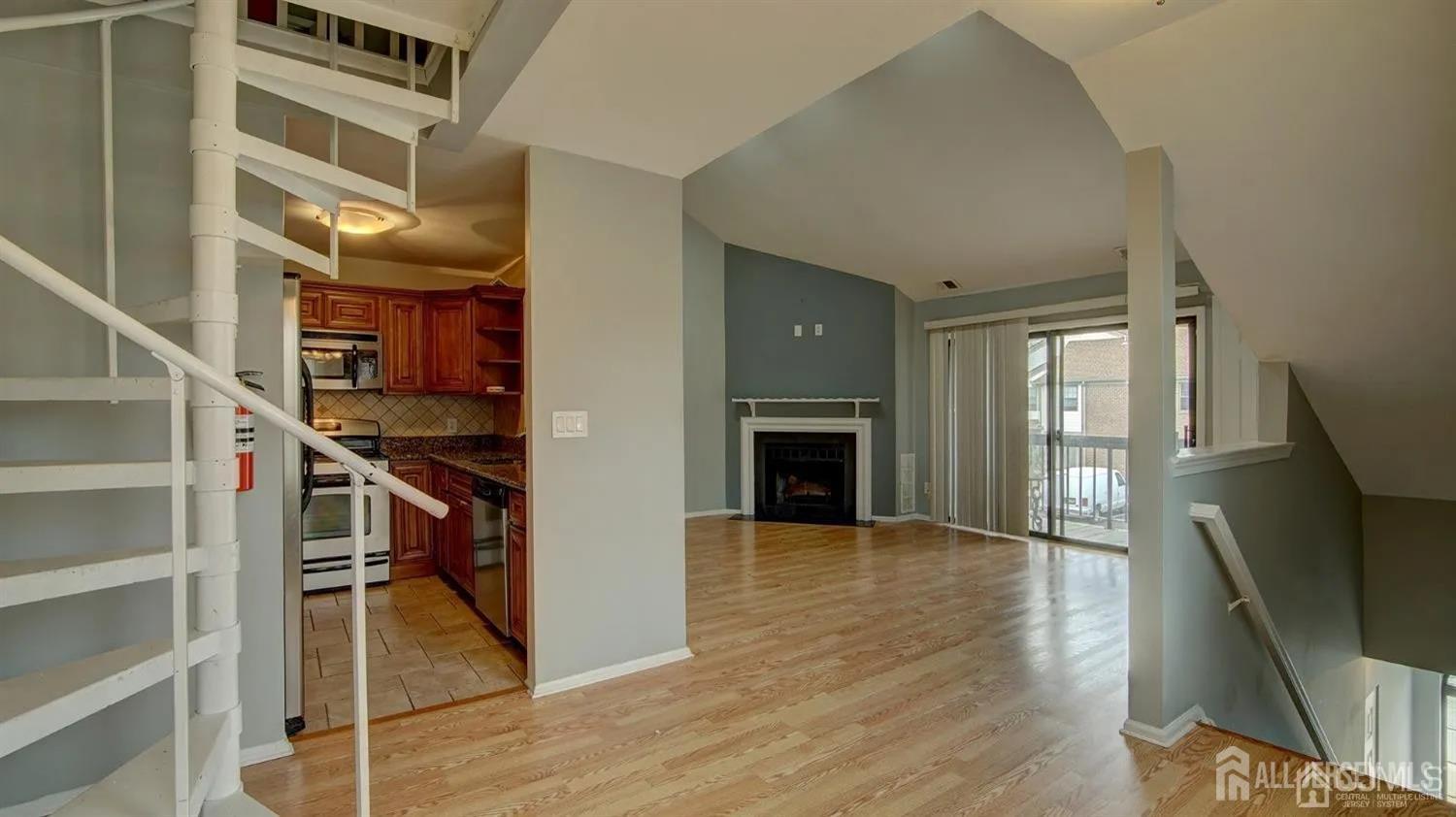 3003 Lighthouse Lane Parlin, NJ 08859 - Photo 12 of 25 a view of entryway and hall with wooden floor