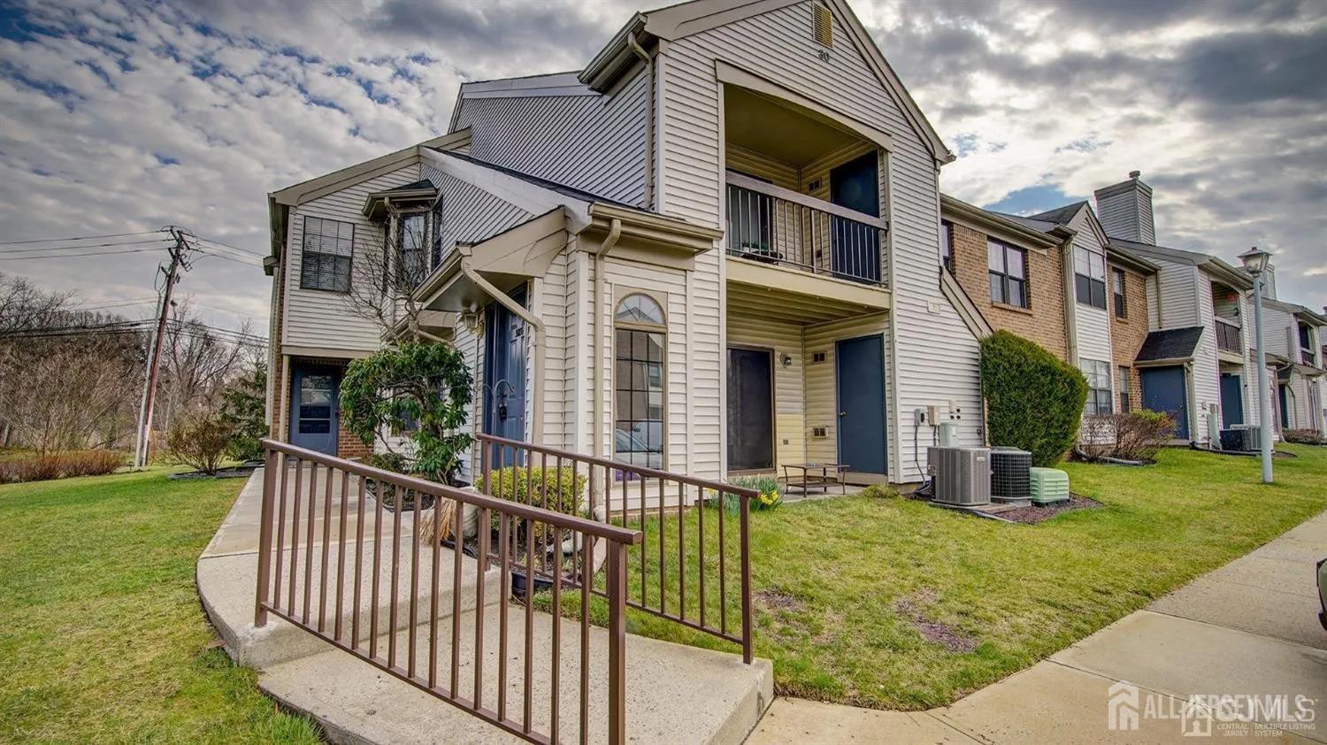 3003 Lighthouse Lane Parlin, NJ 08859 - Photo 2 of 25 a view of an house with backyard and porch