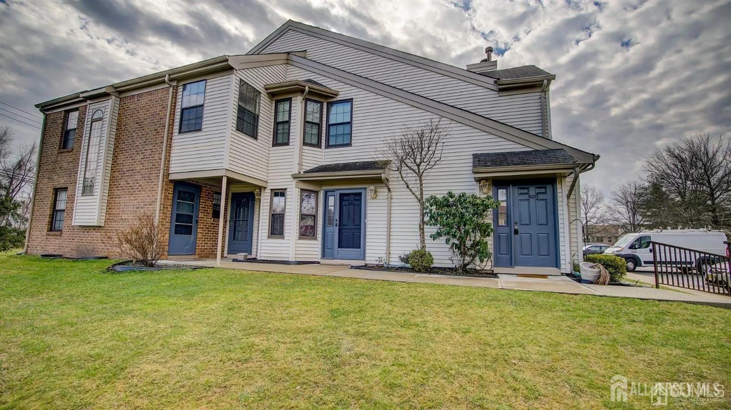 3003 Lighthouse Lane Parlin, NJ 08859 - Photo 3 of 25 a front view of a house with a yard