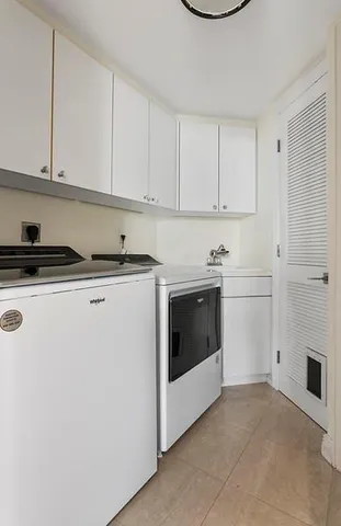 a view of a hallway with a window