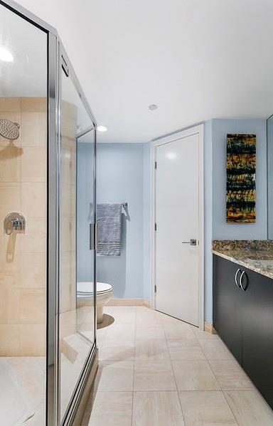 1700 South Ocean Boulevard, Unit 5B Lauderdale-by-the-Sea, FL 33062 - Photo 30 of 47 a bathroom with a tub and shower