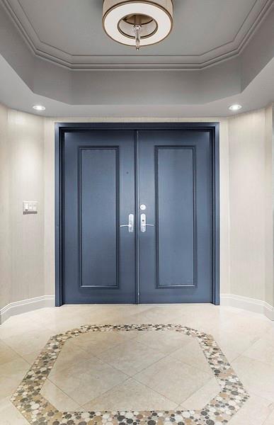 1700 South Ocean Boulevard, Unit 5B Lauderdale-by-the-Sea, FL 33062 - Photo 3 of 47 a view of a hallway with a wooden door