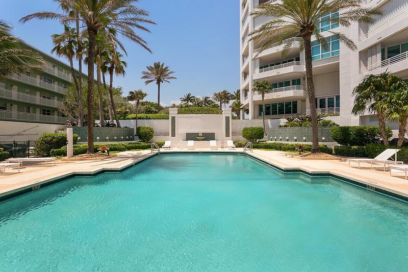 1700 South Ocean Boulevard, Unit 5B Lauderdale-by-the-Sea, FL 33062 - Photo 34 of 47 a swimming pool with outdoor seating and yard