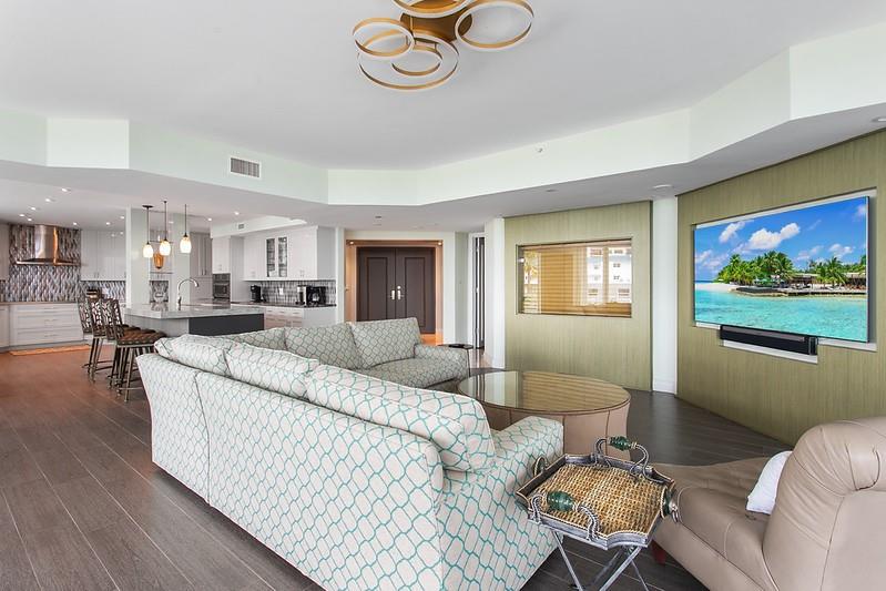 1700 South Ocean Boulevard, Unit 5B Lauderdale-by-the-Sea, FL 33062 - Photo 6 of 47 a living room with furniture and a large window