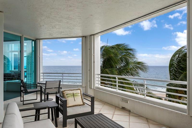1700 South Ocean Boulevard, Unit 5B Lauderdale-by-the-Sea, FL 33062 - Photo 7 of 47 a view of a balcony with chairs