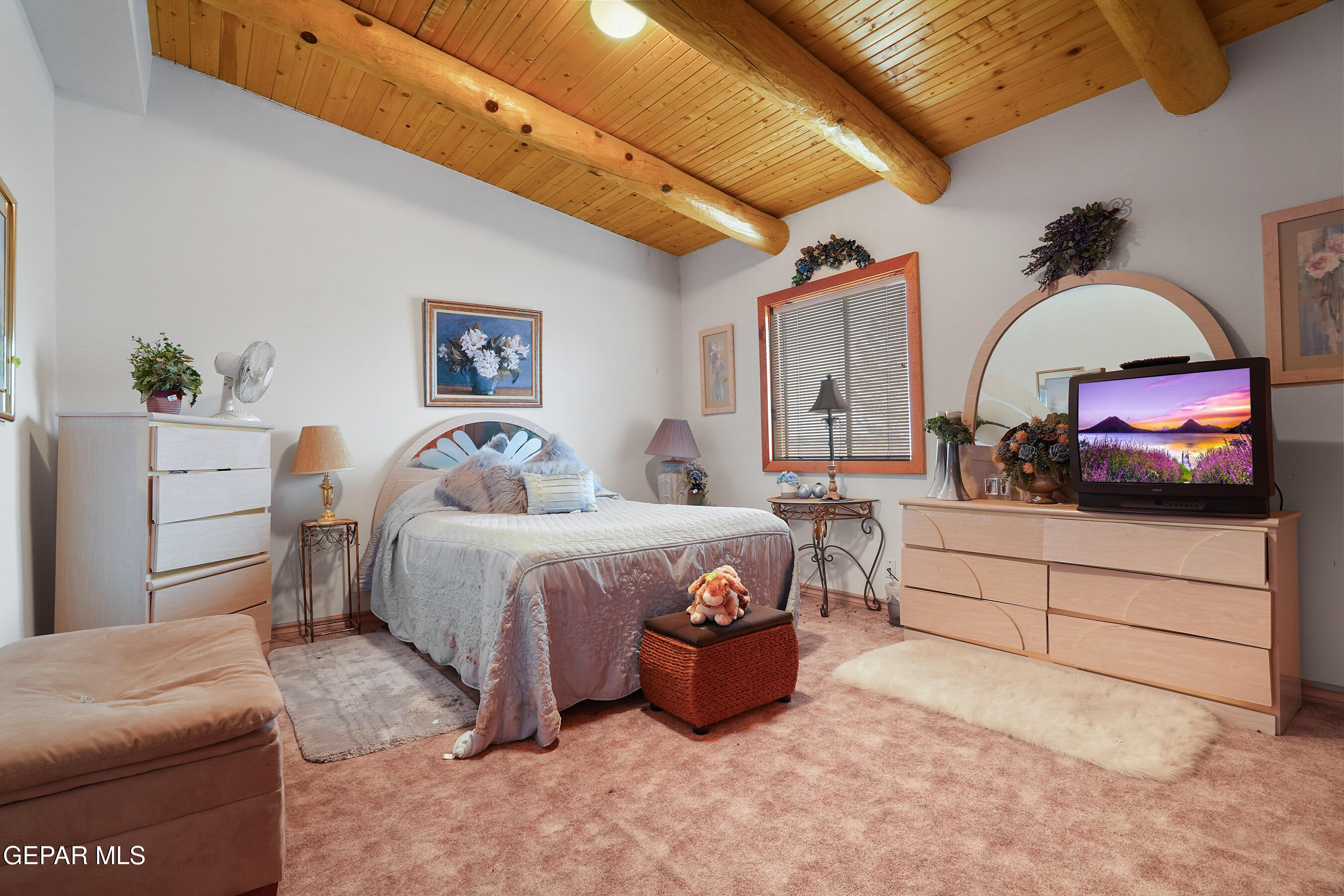 1100 Vinton Road Anthony, TX 79821 - Photo 46 of 83 a spacious bedroom with a bed and a dresser