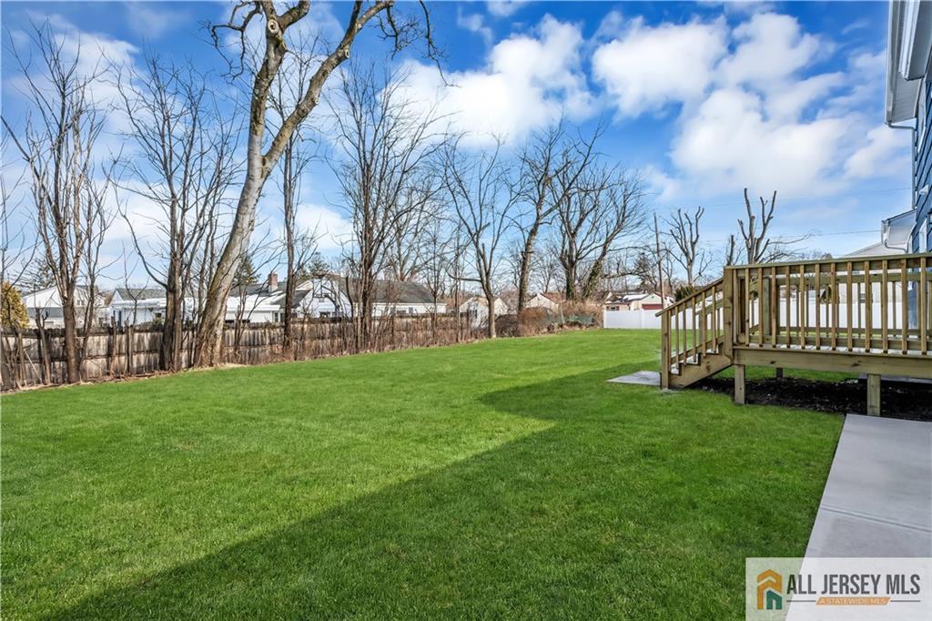 27 Sheppard Place Edison, NJ 08817 - Photo 16 of 75 a view of a garden with a house