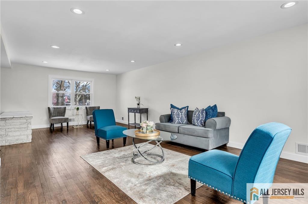 27 Sheppard Place Edison, NJ 08817 - Photo 23 of 75 a living room with furniture and wooden floor