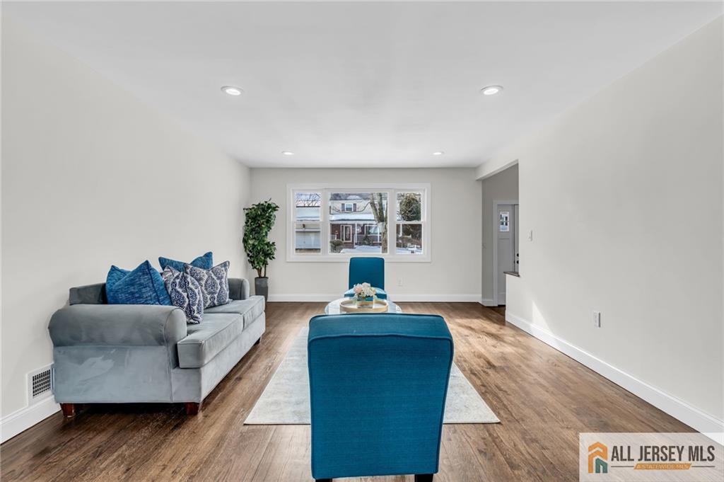 27 Sheppard Place Edison, NJ 08817 - Photo 26 of 75 a living room with furniture and a wooden floor