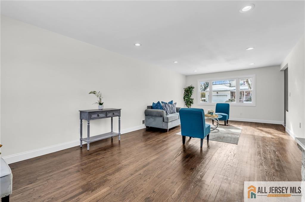27 Sheppard Place Edison, NJ 08817 - Photo 29 of 75 a living room with furniture and a wooden floor
