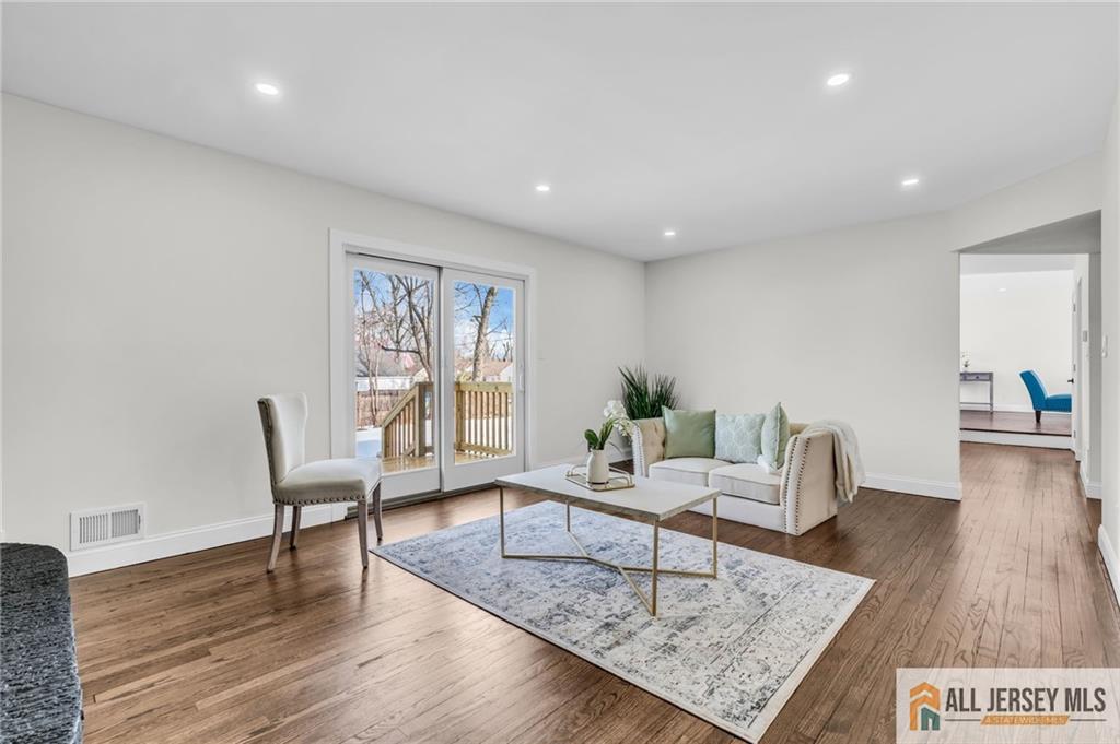 27 Sheppard Place Edison, NJ 08817 - Photo 37 of 75 a living room with furniture and wooden floor