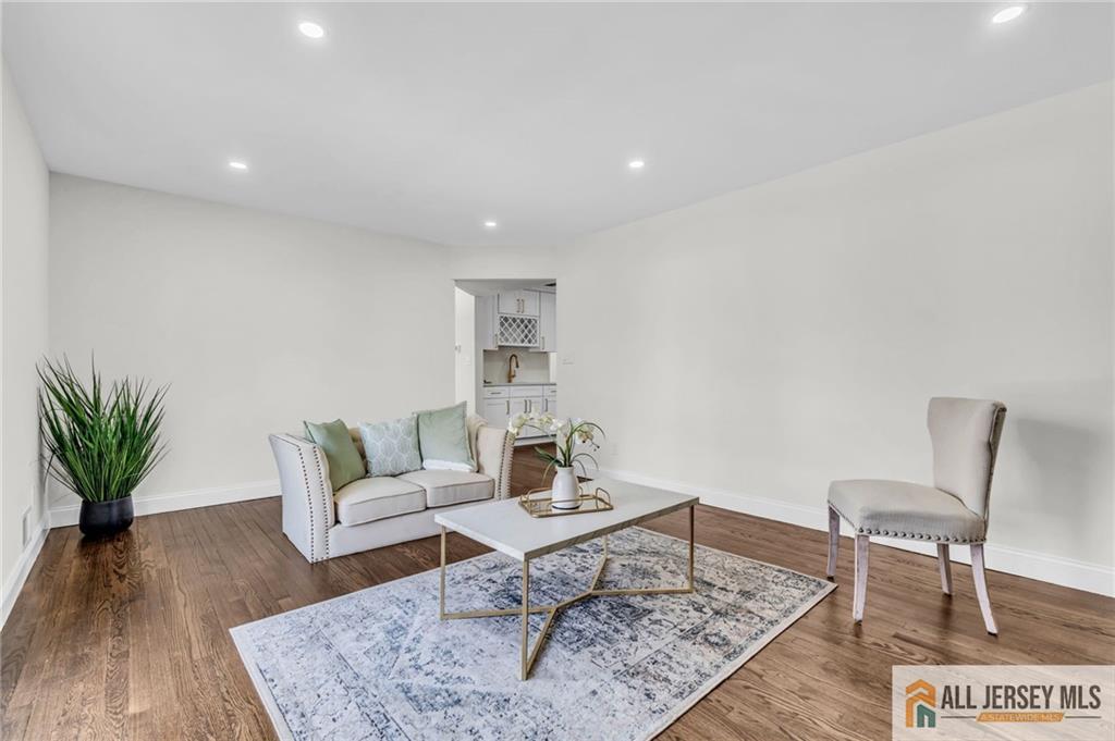27 Sheppard Place Edison, NJ 08817 - Photo 38 of 75 a living room with furniture and wooden floor