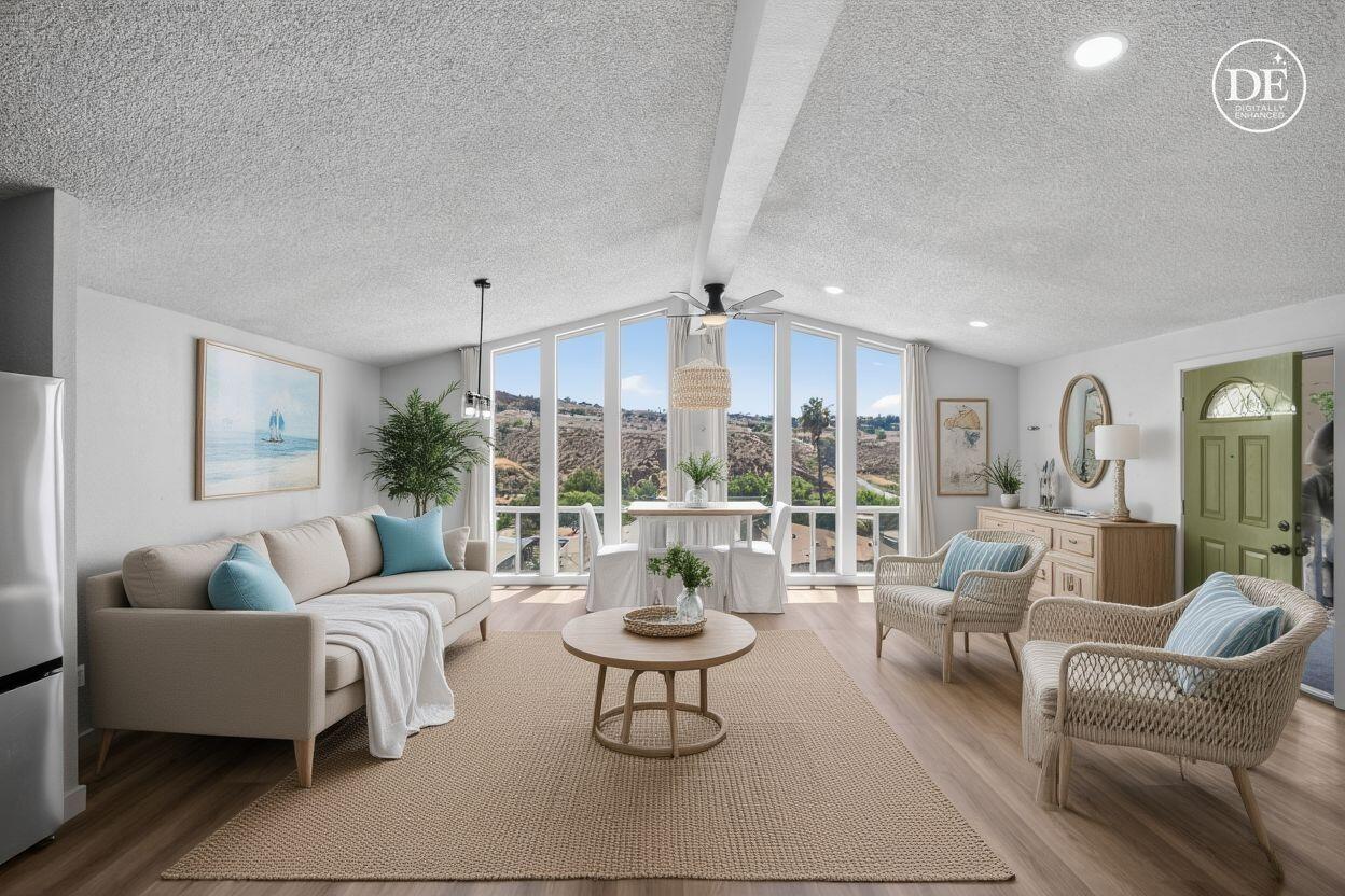 15181 Van Buren Boulevard, Unit 102 Riverside, CA 92504 - Photo 4 of 29 a living room with furniture and a large window