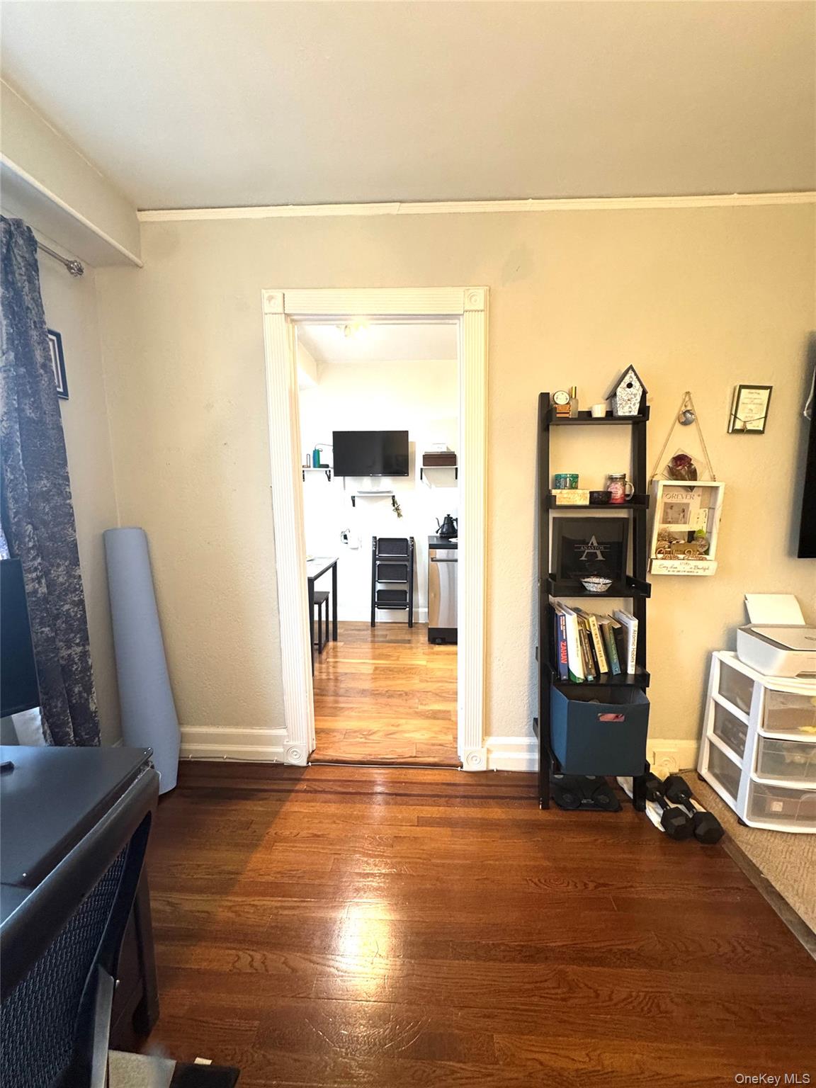 69 Harney Road, Unit 5B Scarsdale, NY 10583 - Photo 8 of 17 a view of a workspace with furniture and wooden floor