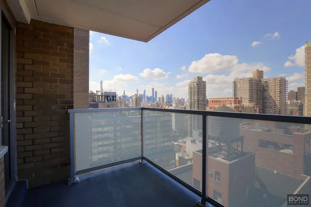 a view of a city from a balcony