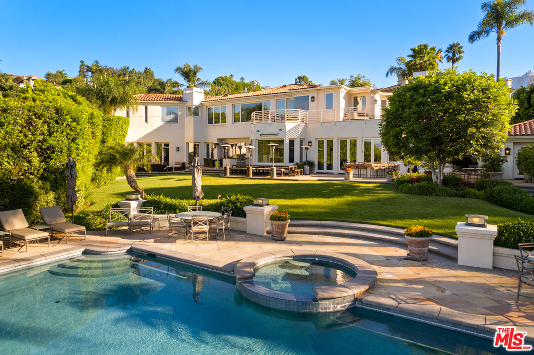 14035 Aubrey Road Beverly Hills, CA 90210 - Photo 2 of 24 a view of a house with yard and sitting area
