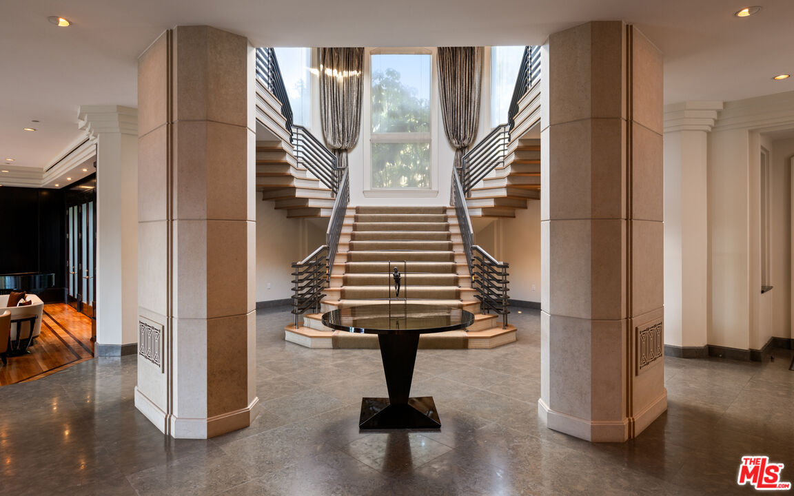 14035 Aubrey Road Beverly Hills, CA 90210 - Photo 5 of 24 a view of entryway with livingroom and stairs