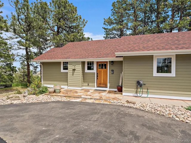 a view of a patio with couches chairs and a table