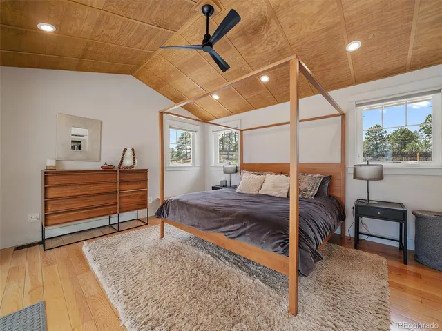 a view of a house with backyard porch and sitting area
