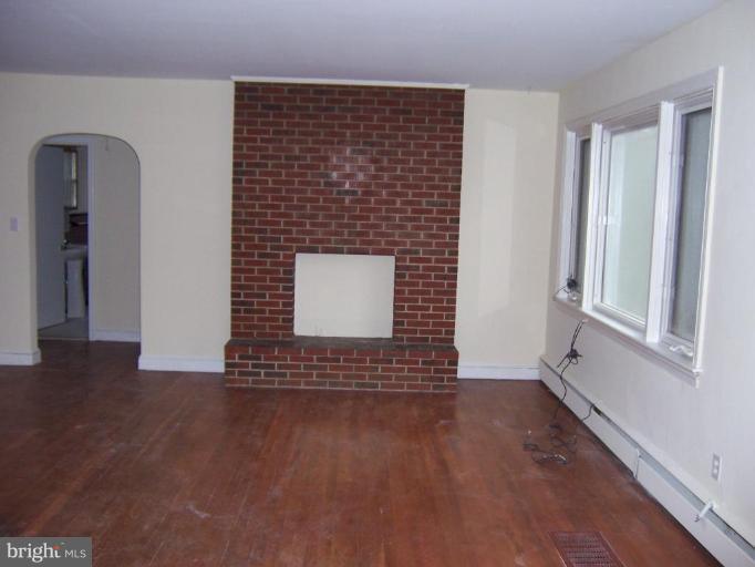 7570 Quaker Neck Road Chestertown, MD 21620 - Photo 4 of 5 LIVING ROOM WITH FAKE FRPL.