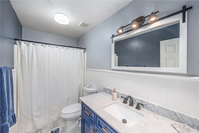 a room with furniture and a book shelf