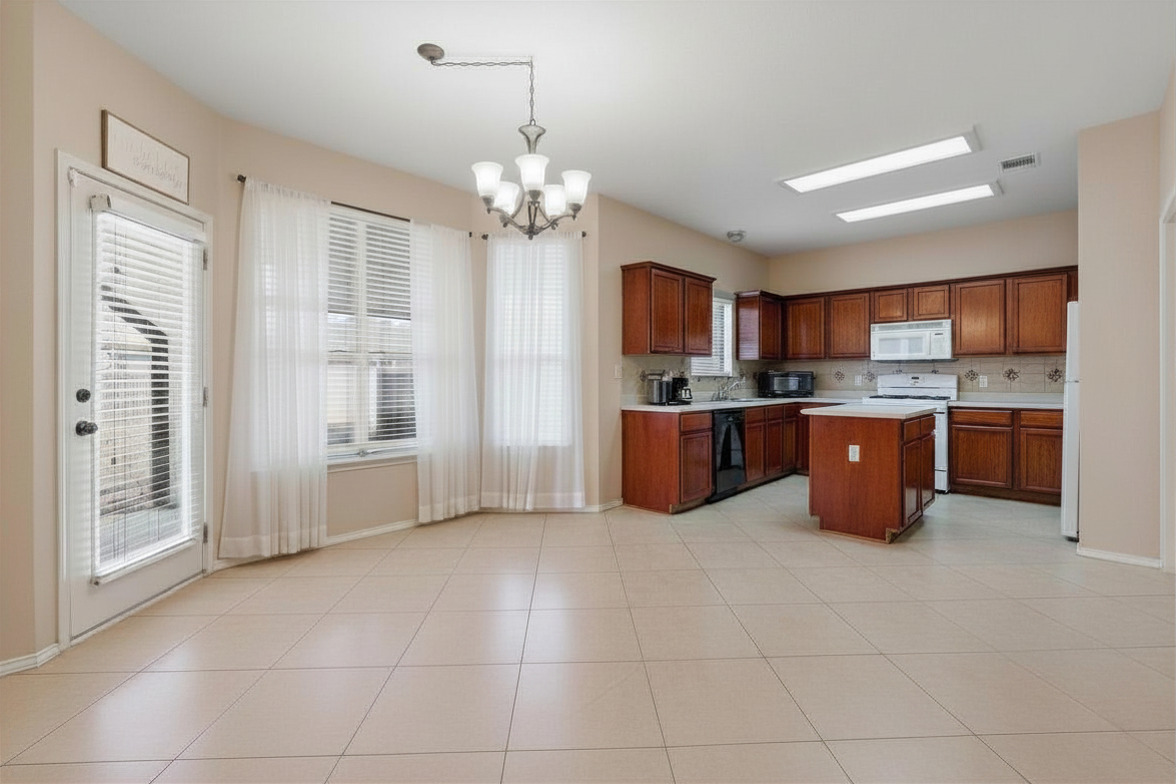 1424 Marsh Harbour Drive Round Rock, TX 78664 - Photo 6 of 23 Kitchen and Breakfast Nook