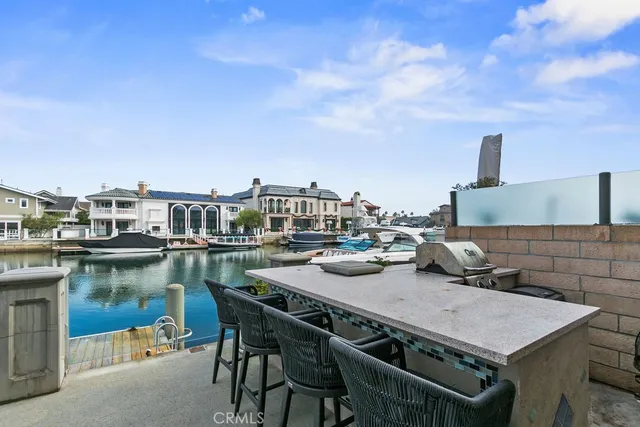 a terrace with a table and chairs