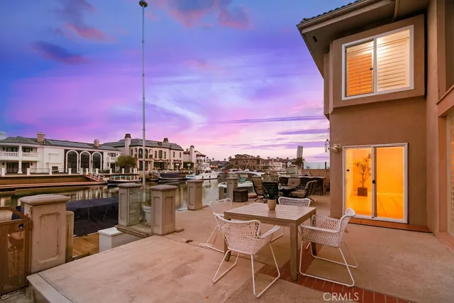 a view of a terrace with furniture and stove