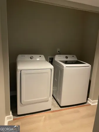 a utility room with dryer and washer