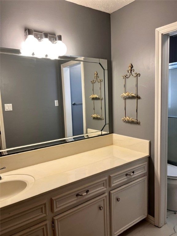 2600 Arbor Drive Bryan, TX 77802 - Photo 17 of 29 a bathroom with a sink and mirror