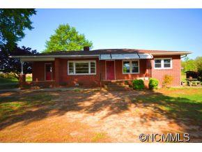 1422 Prince Road Columbus, NC 28722 - Photo 1 of 24 a front view of house with yard