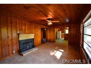 1422 Prince Road Columbus, NC 28722 - Photo 12 of 24 a view of empty room with a fireplace