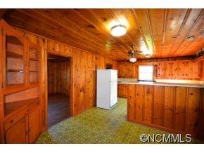 1422 Prince Road Columbus, NC 28722 - Photo 15 of 24 a view of entryway with a wooden door