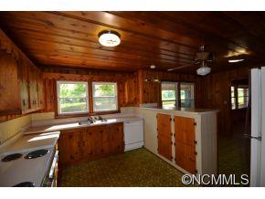 1422 Prince Road Columbus, NC 28722 - Photo 16 of 24 a kitchen with sink and window