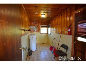 1422 Prince Road Columbus, NC 28722 - Photo 17 of 24 a view of entryway and hall with wooden floor